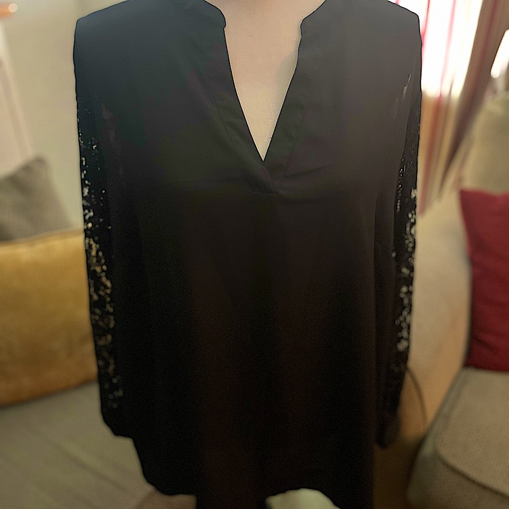 Tahari woman's blouse with black lace sleeves . Very pretty and elegant .